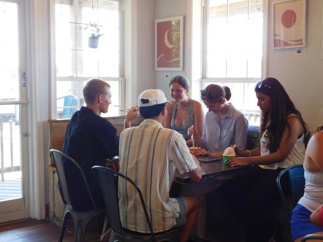 group of friends talking at event